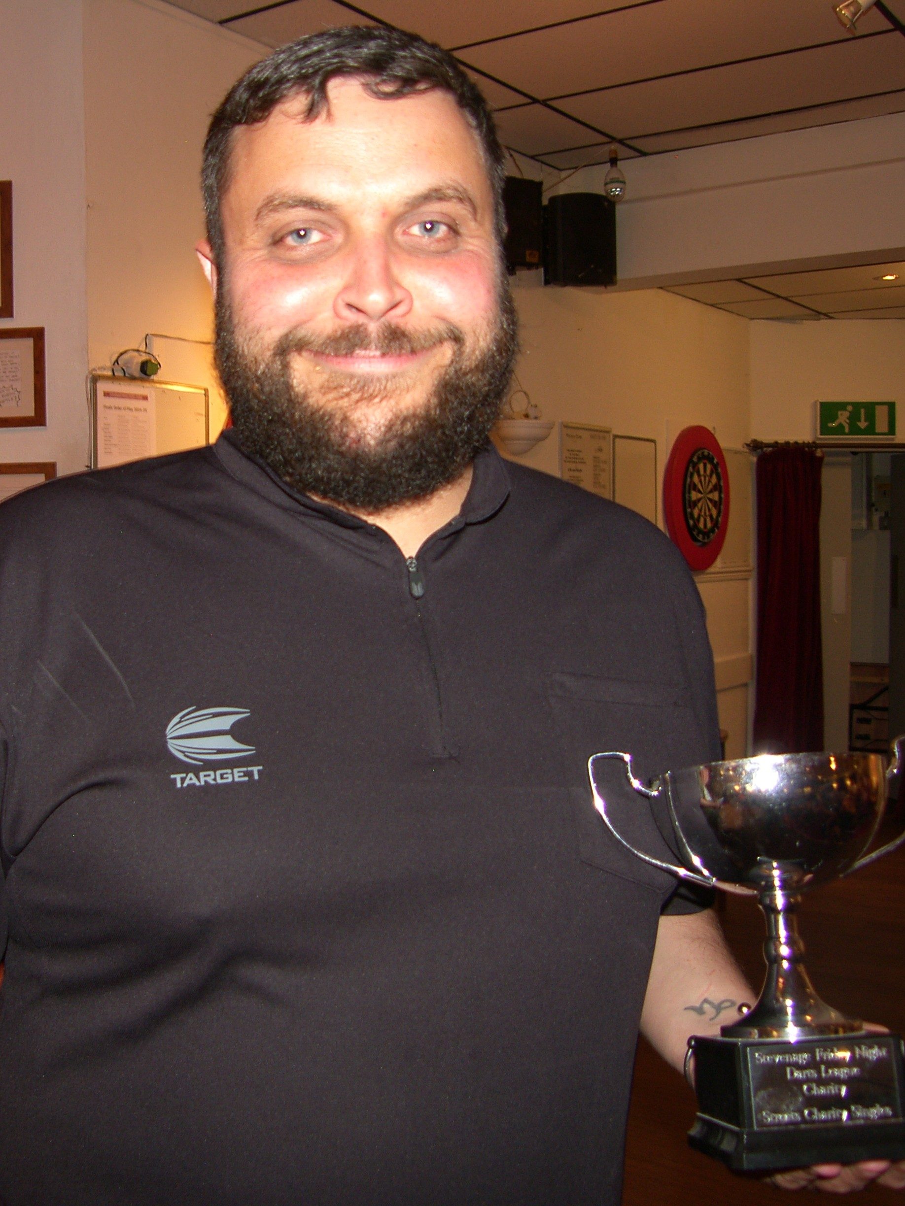 Chris Jones with the Charity Cup
